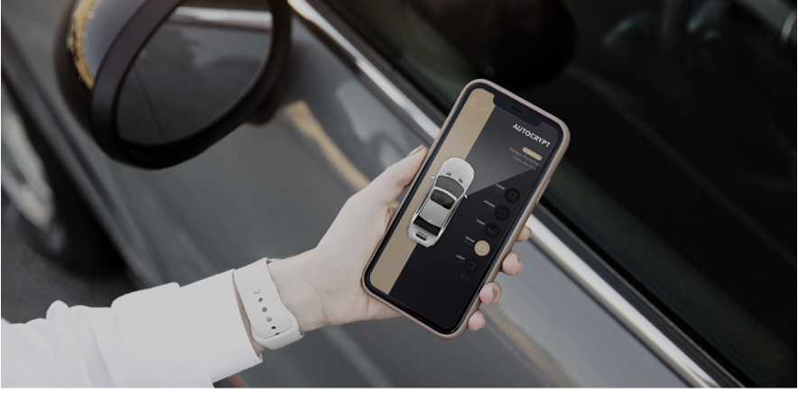 holding digital key on phone by vehicle